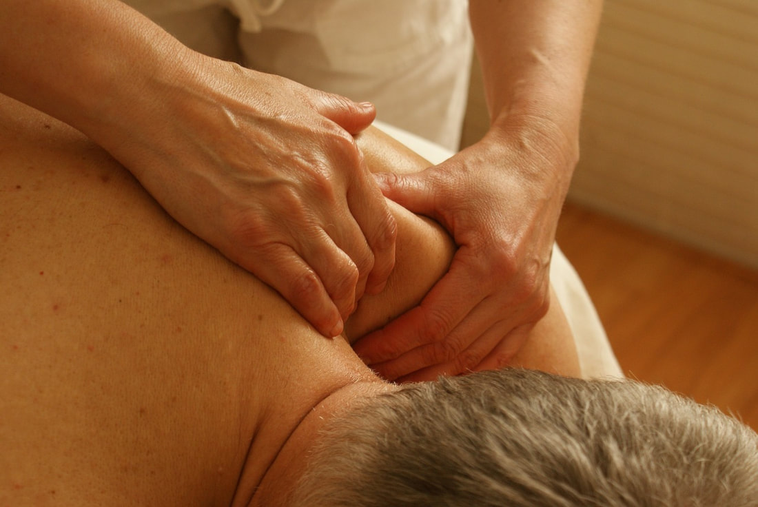 Swedish Massage on shoulder | salt lake city massage services | J Massage